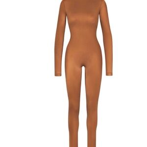 SKIMS Long Sleeve Full-Length Jumpsuit in Warm Camel